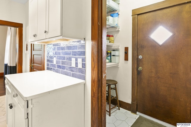 4340 Miami St, Omaha, NE 68104 - tiled entrance foyer featuring baseboards