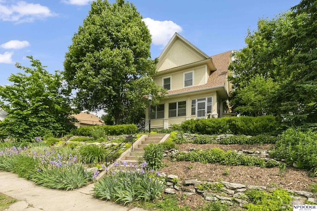 4340 Miami St, Omaha, NE 68104 - rear view of property featuring stairway