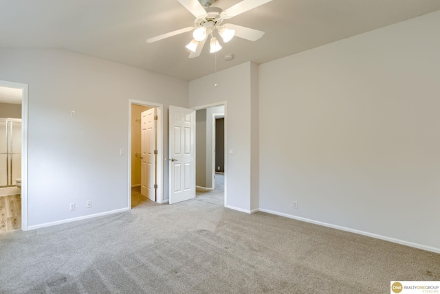 18653 Borman St, Omaha, NE 68135 - unfurnished bedroom with carpet, ensuite bathroom, vaulted ceiling, a walk in closet, and a ceiling fan
