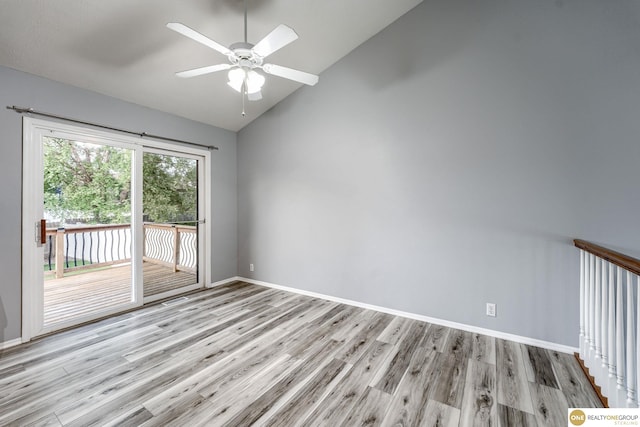 18653 Borman St, Omaha, NE 68135 - unfurnished room with vaulted ceiling, wood finished floors, and a ceiling fan