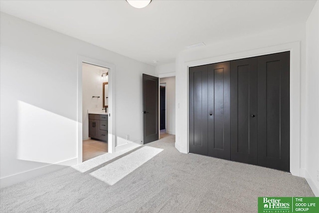 5721 N 197th Ave, Omaha, NE 68022 - unfurnished bedroom with carpet floors, a closet, and ensuite bathroom