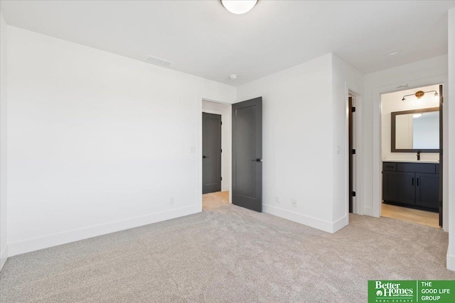 5721 N 197th Ave, Omaha, NE 68022 - unfurnished bedroom with light carpet and connected bathroom
