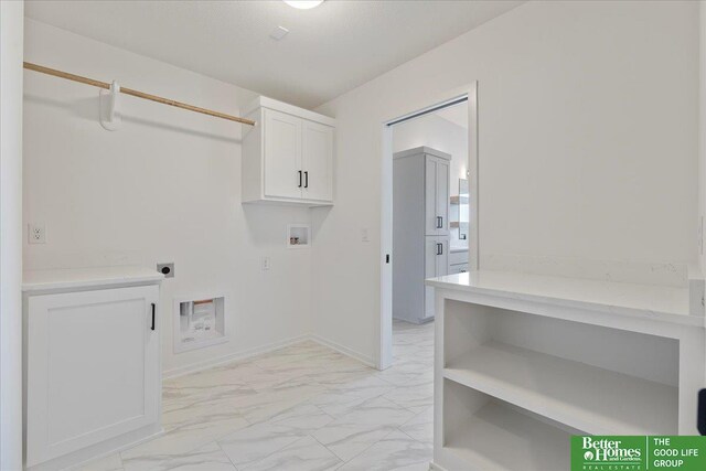 5721 N 197th Ave, Omaha, NE 68022 - washroom featuring hookup for an electric dryer, light marble finish floors, cabinet space, and washer hookup