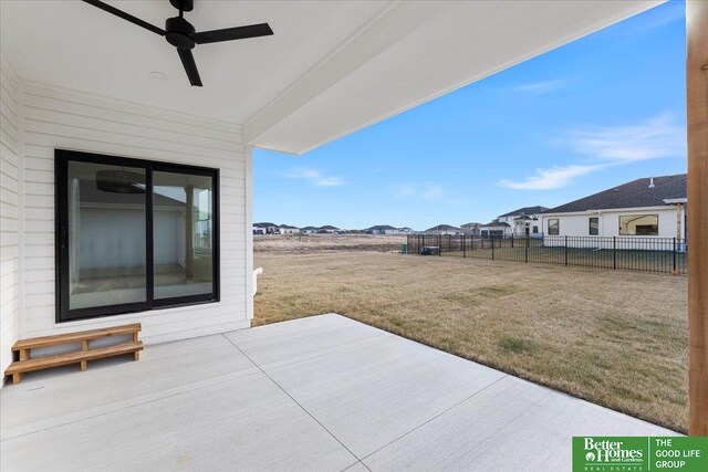 5721 N 197th Ave, Omaha, NE 68022 - view of patio / terrace featuring ceiling fan and a residential view