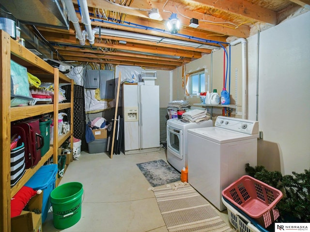 1809 SW Derek Ave, Lincoln, NE 68522 - basement with white refrigerator with ice dispenser, independent washer and dryer, and electric panel