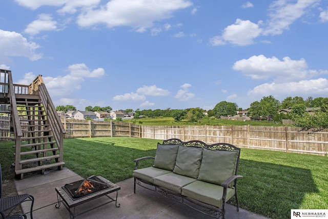 1809 SW Derek Ave, Lincoln, NE 68522 - fenced backyard featuring stairway, a patio, and a fire pit