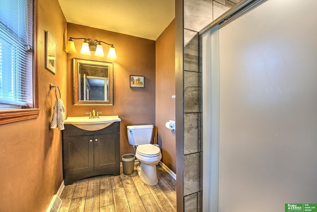 14824 Charles Plz, Omaha, NE 68154 - bathroom featuring wood finished floors and vanity
