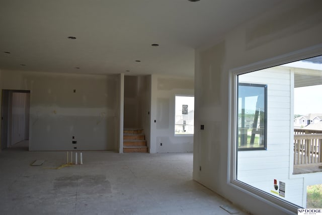11001 N 170th St, Bennington, NE 68007 - spare room featuring plenty of natural light and stairs