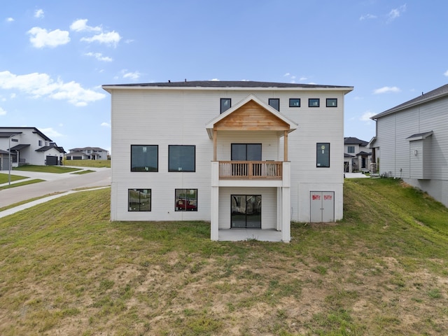 11001 N 170th St, Bennington, NE 68007 - rear view of property featuring a yard, a balcony, and a residential view