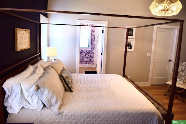 5445 Kestrel Pkwy, Omaha, NE 68022 - bedroom featuring wood finished floors and baseboards