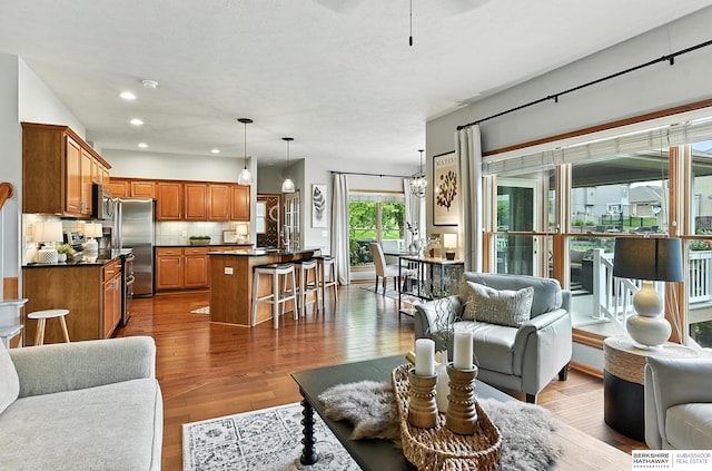 17534 Jefferson St, Omaha, NE 68135 - living room featuring dark wood-type flooring and recessed lighting