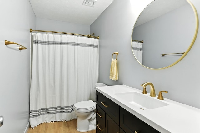 17534 Jefferson St, Omaha, NE 68135 - full bathroom with vanity, wood finished floors, and a shower with shower curtain