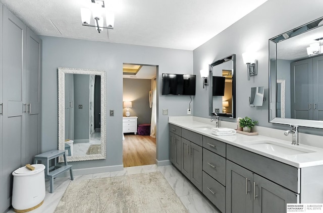 17534 Jefferson St, Omaha, NE 68135 - bathroom with marble look tile flooring and double vanity