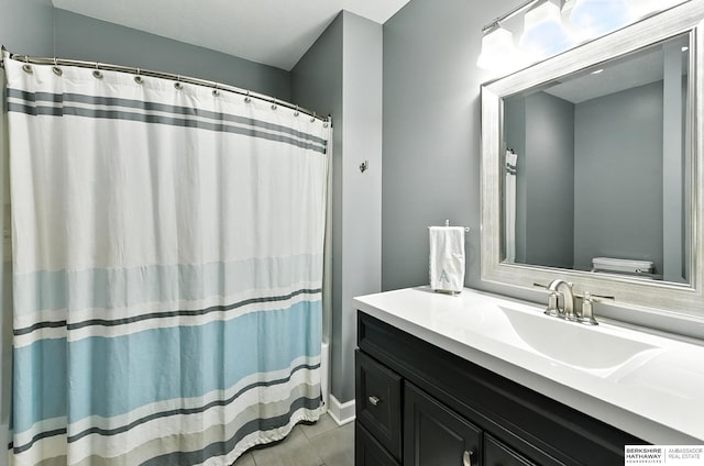 17534 Jefferson St, Omaha, NE 68135 - bathroom featuring vanity, a shower with shower curtain, and tile patterned flooring