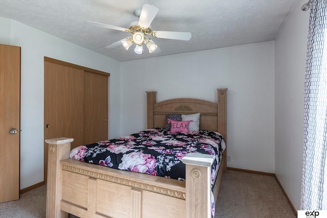 6633 N 115th St, Omaha, NE 68164 - bedroom with light carpet, a closet, and a ceiling fan