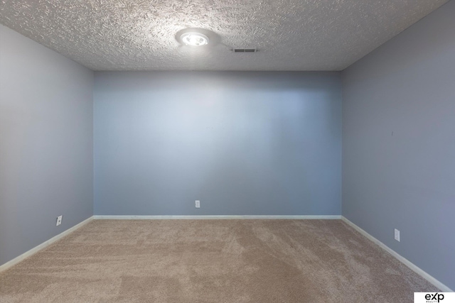 6633 N 115th St, Omaha, NE 68164 - carpeted spare room featuring a textured ceiling and baseboards