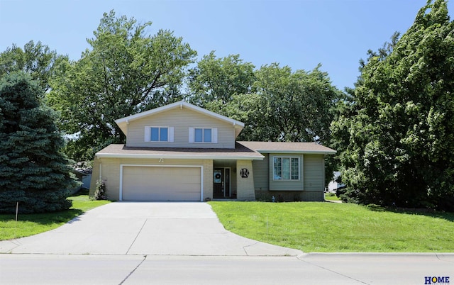 1365 N Chestnut St, Wahoo, NE 68066 - view of front facade with driveway, a front lawn, and a garage