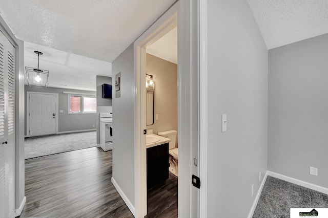 1207 B St, Lincoln, NE 68502 - hall with a textured ceiling and wood finished floors