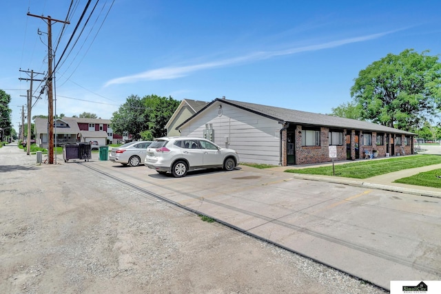 1207 B St, Lincoln, NE 68502 - view of front of property with uncovered parking and brick siding