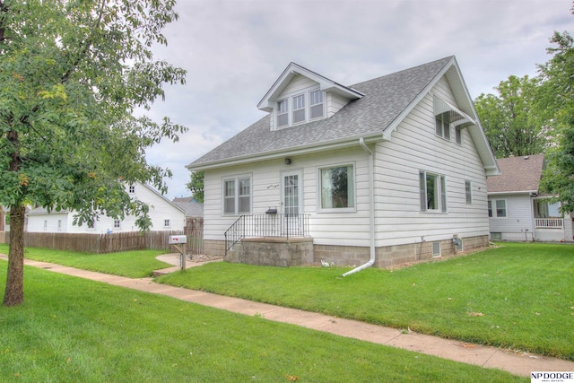 1107 E 1st St, Fremont, NE 68025 - view of front of house featuring a shingled roof