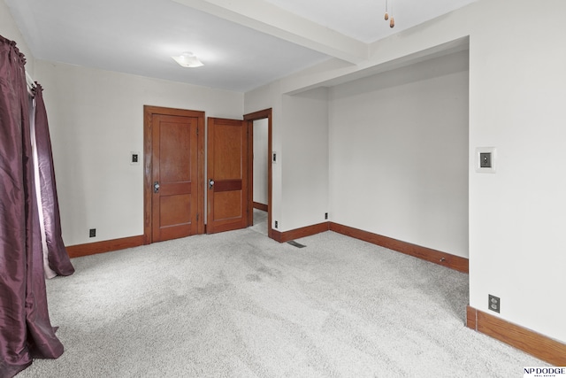 1107 E 1st St, Fremont, NE 68025 - carpeted empty room featuring baseboards