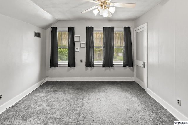 1107 E 1st St, Fremont, NE 68025 - unfurnished room featuring carpet floors, a ceiling fan, and lofted ceiling