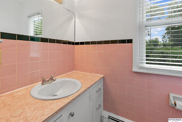 7922 Himebaugh Ave, Omaha, NE 68134 - bathroom with vanity and tile walls