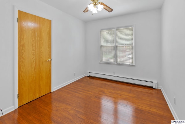 7922 Himebaugh Ave, Omaha, NE 68134 - unfurnished room with baseboard heating, ceiling fan, and wood finished floors