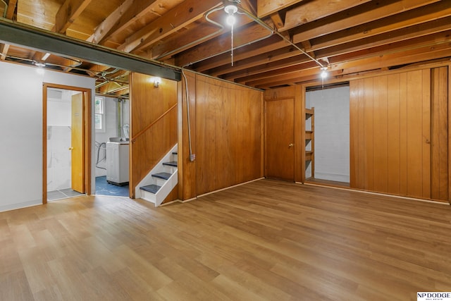 7922 Himebaugh Ave, Omaha, NE 68134 - finished basement featuring washer / dryer, wood finished floors, and stairs