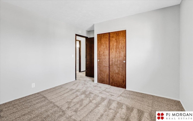 14030 Orchard Ave, Omaha, NE 68137 - unfurnished bedroom with carpet flooring and a closet
