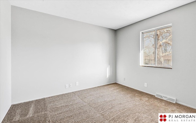 14030 Orchard Ave, Omaha, NE 68137 - carpeted empty room featuring baseboards