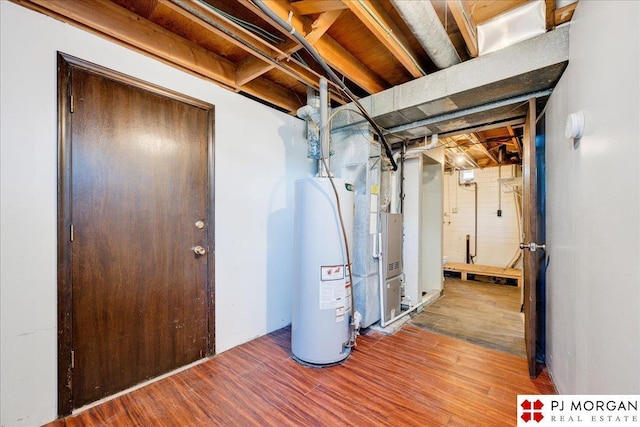 14030 Orchard Ave, Omaha, NE 68137 - unfinished below grade area with water heater, wood finished floors, and heating unit