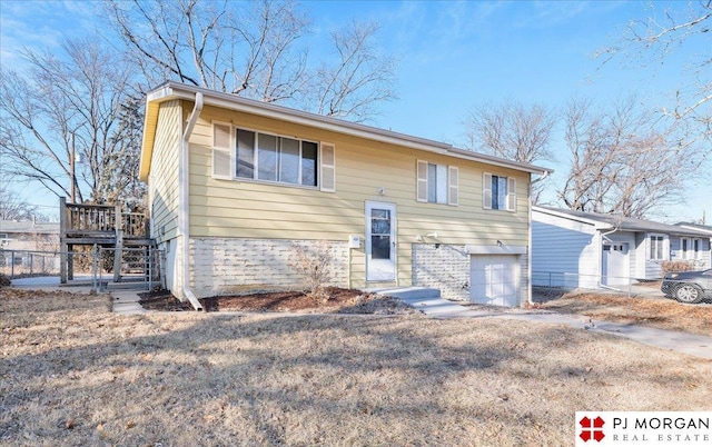 14030 Orchard Ave, Omaha, NE 68137 - split foyer home with a garage and stairs