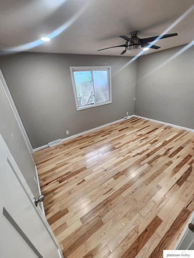 5020 N 106th St, Omaha, NE 68134 - spare room with hardwood / wood-style flooring and ceiling fan