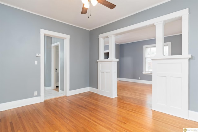 3207 Castelar St, Omaha, NE 68105 - spare room featuring ceiling fan, light wood finished floors, and crown molding