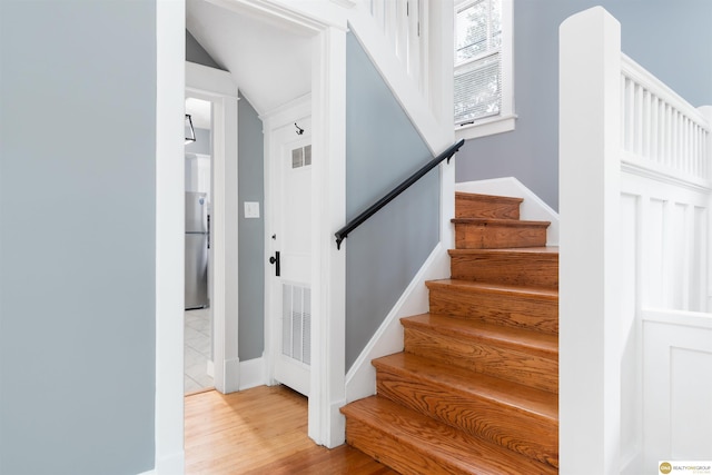 3207 Castelar St, Omaha, NE 68105 - staircase featuring wood finished floors
