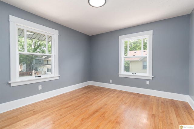 3207 Castelar St, Omaha, NE 68105 - unfurnished room with hardwood / wood-style flooring and baseboards
