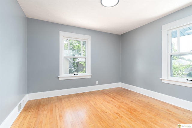 3207 Castelar St, Omaha, NE 68105 - spare room featuring light wood-type flooring and baseboards