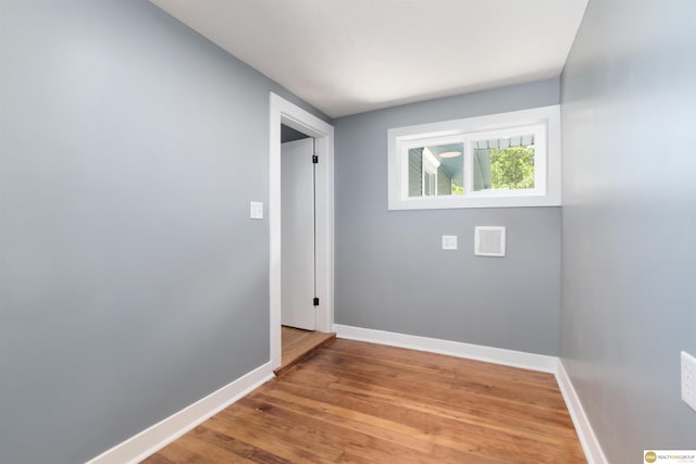 3207 Castelar St, Omaha, NE 68105 - spare room featuring baseboards and wood finished floors