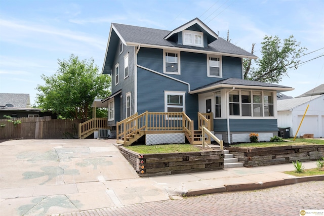 3207 Castelar St, Omaha, NE 68105 - american foursquare style home featuring a sunroom