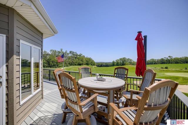 223 N Lakeview Way, Ashland, NE 68003 - wooden deck featuring outdoor dining space, a lawn, and view of golf course