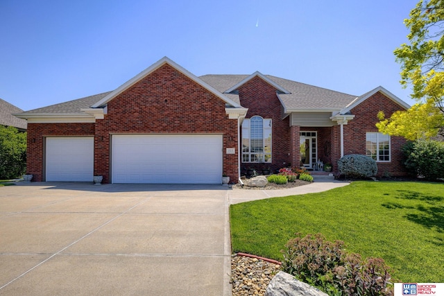 223 N Lakeview Way, Ashland, NE 68003 - view of front of house featuring brick siding, a garage, concrete driveway, a front lawn, and roof with shingles