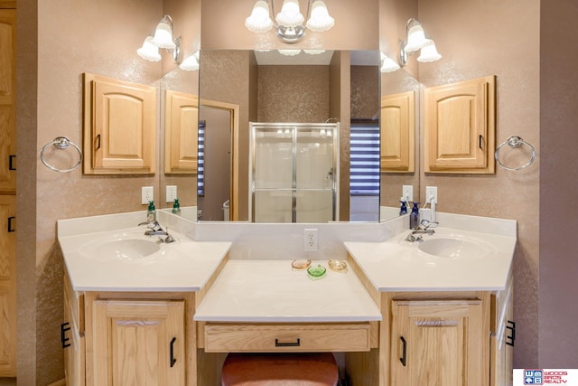 223 N Lakeview Way, Ashland, NE 68003 - bathroom with a shower stall, two vanities, a textured wall, and a chandelier