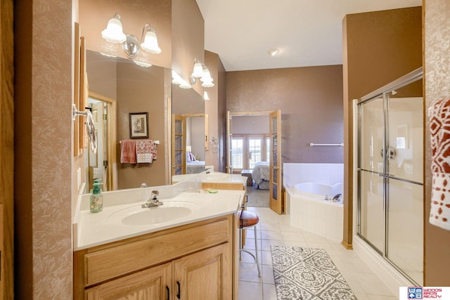 223 N Lakeview Way, Ashland, NE 68003 - bathroom featuring connected bathroom, vanity, a bath, tile patterned flooring, and a shower stall