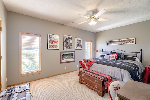 223 N Lakeview Way, Ashland, NE 68003 - carpeted bedroom featuring baseboards and ceiling fan