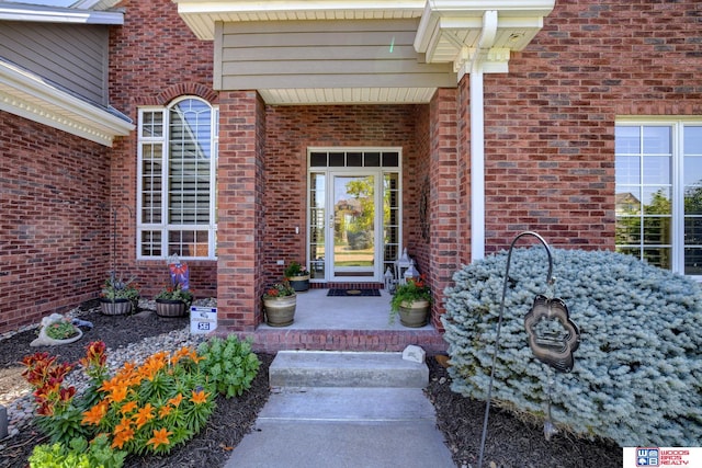 223 N Lakeview Way, Ashland, NE 68003 - doorway to property with brick siding and a porch