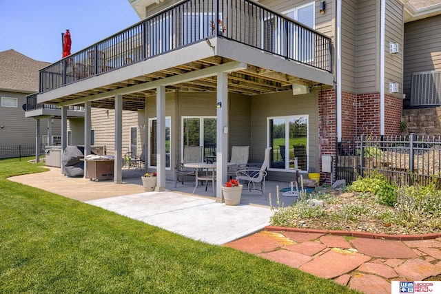 223 N Lakeview Way, Ashland, NE 68003 - rear view of property with a patio, a deck, and brick siding