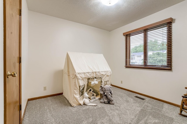 5001 W Sparrow Ln, Lincoln, NE 68528 - bedroom with carpet and a textured ceiling