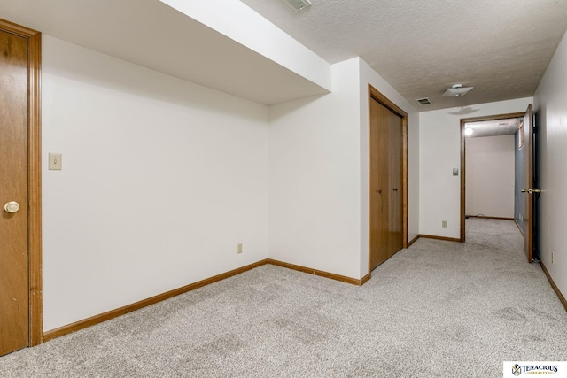 5001 W Sparrow Ln, Lincoln, NE 68528 - empty room featuring light carpet and a textured ceiling