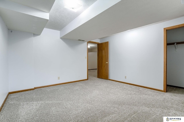 5001 W Sparrow Ln, Lincoln, NE 68528 - finished basement featuring carpet flooring and a textured ceiling